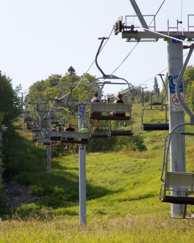 Chairlift in summer at Mont Lac-Vert.