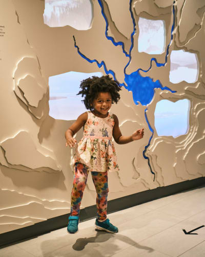 A child at the Musée ilnu de Mashteuiatsh.