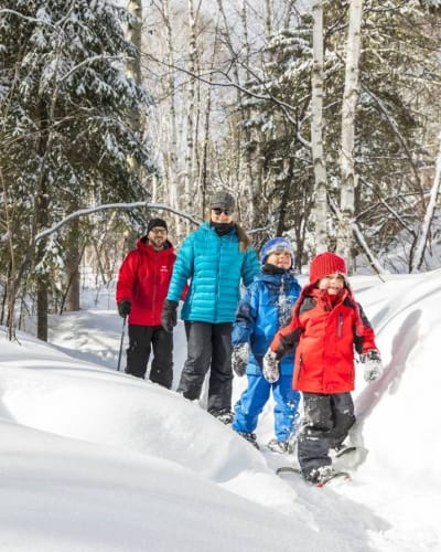 Family snowshoeing in winter.