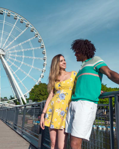 Couple in front of La Grande Roue de Montréal