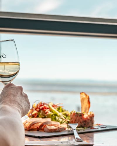 Dish and wine glass at Restaurant Allegro.