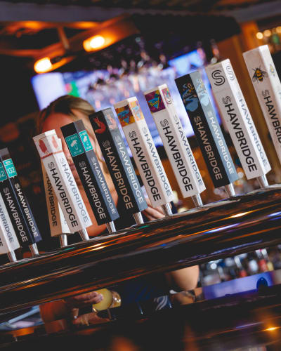 Shawbridge - Microbrasserie et Charcuteries -  A row of beer taps