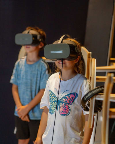 Two children and virtual reality at Statera—the fabulous archipelago.