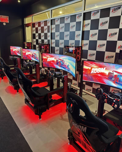 Four racing simulators at Vroom Simulation.