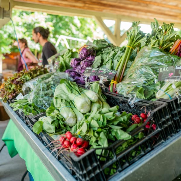 Compton evening market - A kiosk full of vegetables.