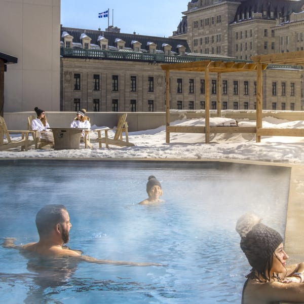 Outdoor pool on the roof of a hotel in winter.