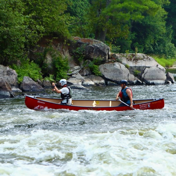 Canoe in river.