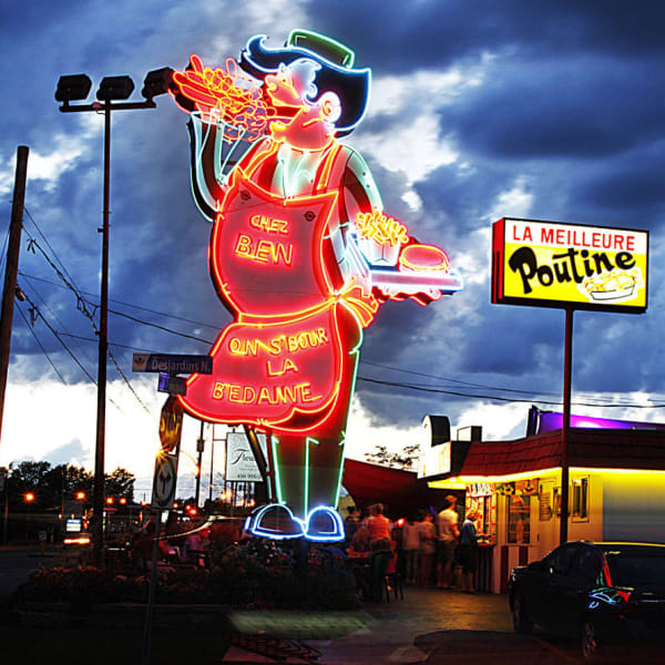 Enseigne néon de Cantine Chez Ben on s’bour la bedaine.