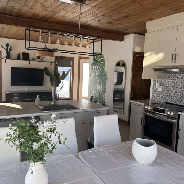 Kitchen and living room of chalet.
