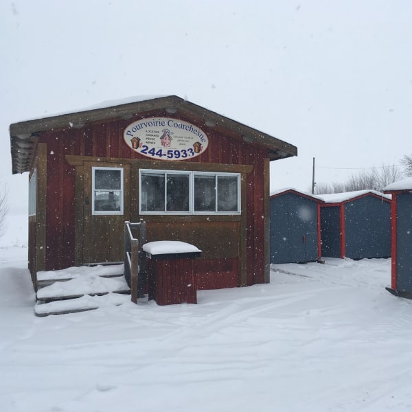 Fishing hut on a frozen lake.