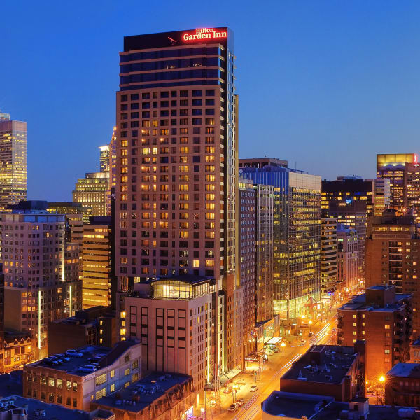 Hilton Garden Inn Montréal Centre-Ville illuminated.