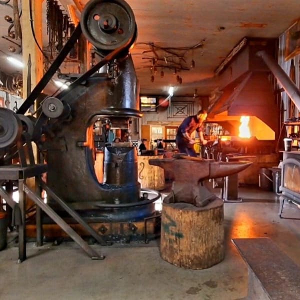 A blacksmith in his workshop.