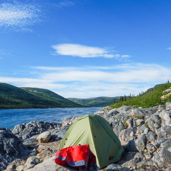 Wild camping by a river.
