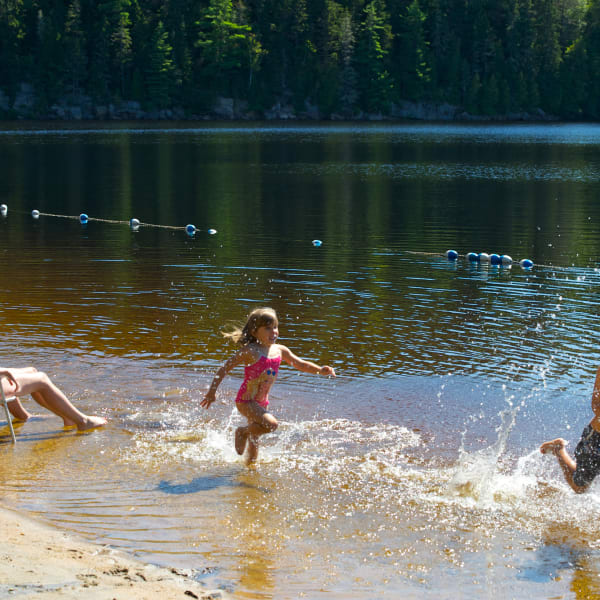 Parents and kids at the beach.