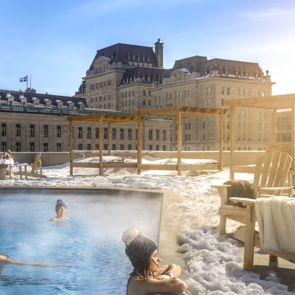 Outdoor pool on the roof of a hotel in winter.