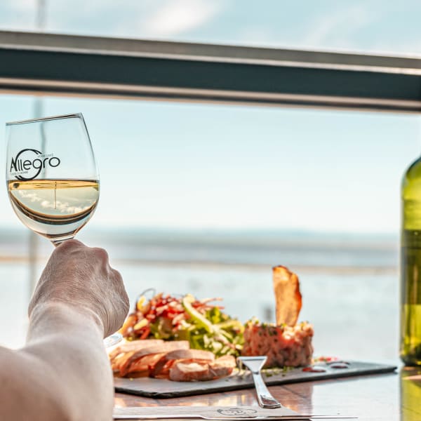 Dish and wine glass at Restaurant Allegro.