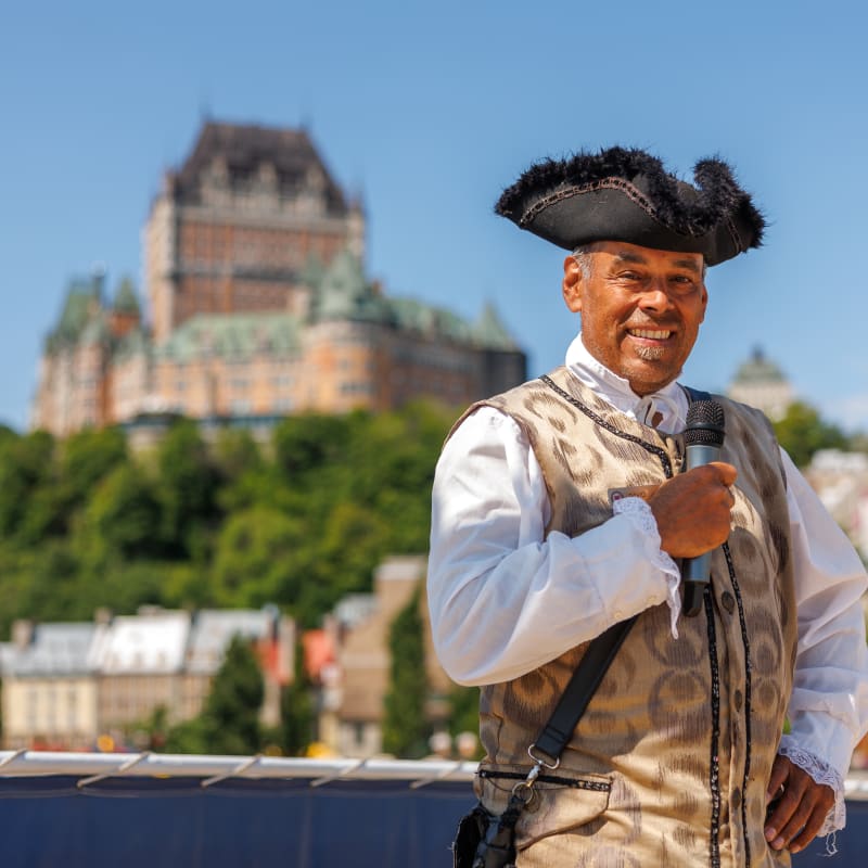 Guide in a period costume on a cruise in Québec City.