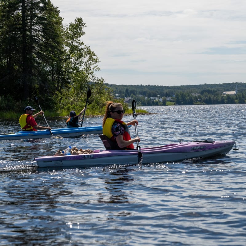 3 people in kayaks at Ermitage Saint-Antoine.