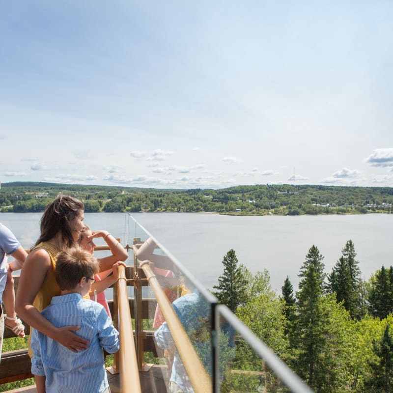 Family at a lookout at Ermitage Saint-Antoine.