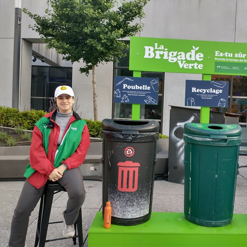 Waste sorting station with a member of the green brigade