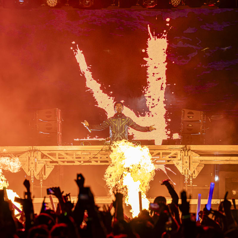 Riverside Festival - DJ on stage with flames.