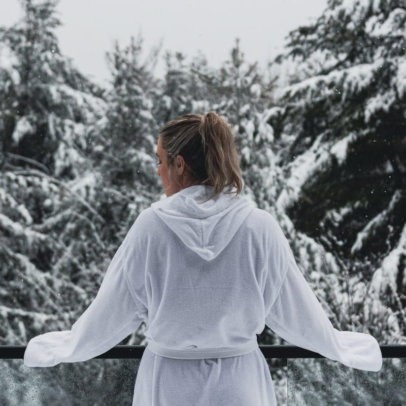 A girl admiring a winter landscape