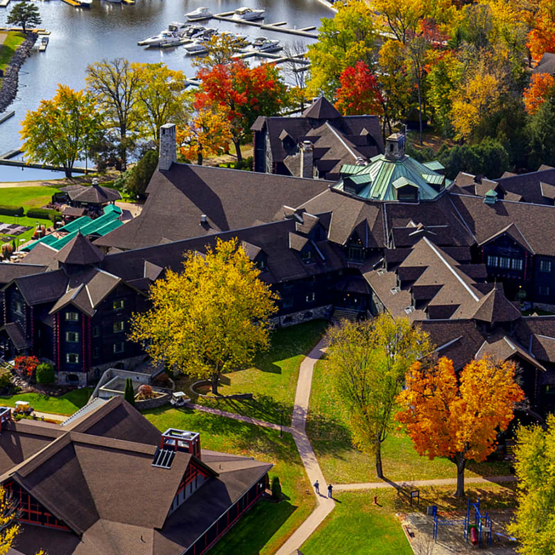 Fairmont Le Château Montebello and the Ottawa River in the fall.