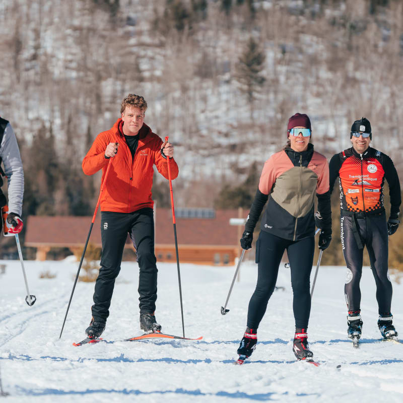 Group of 5 cross-country skiers.