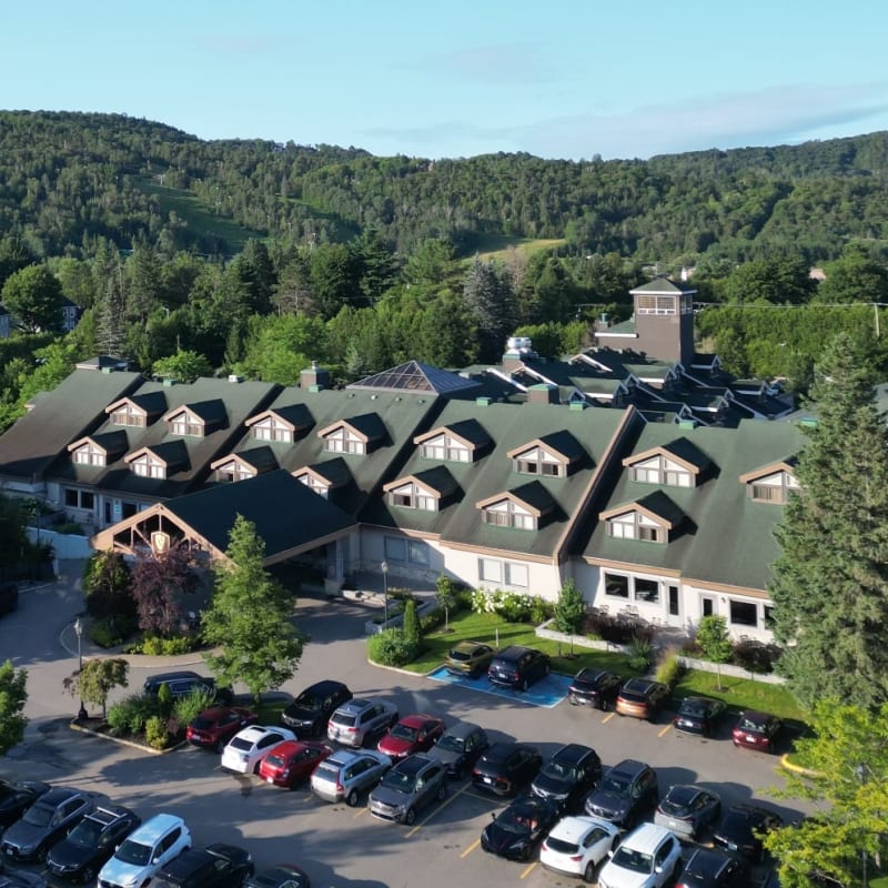 Manoir Saint-Sauveur and the mountain in the background.