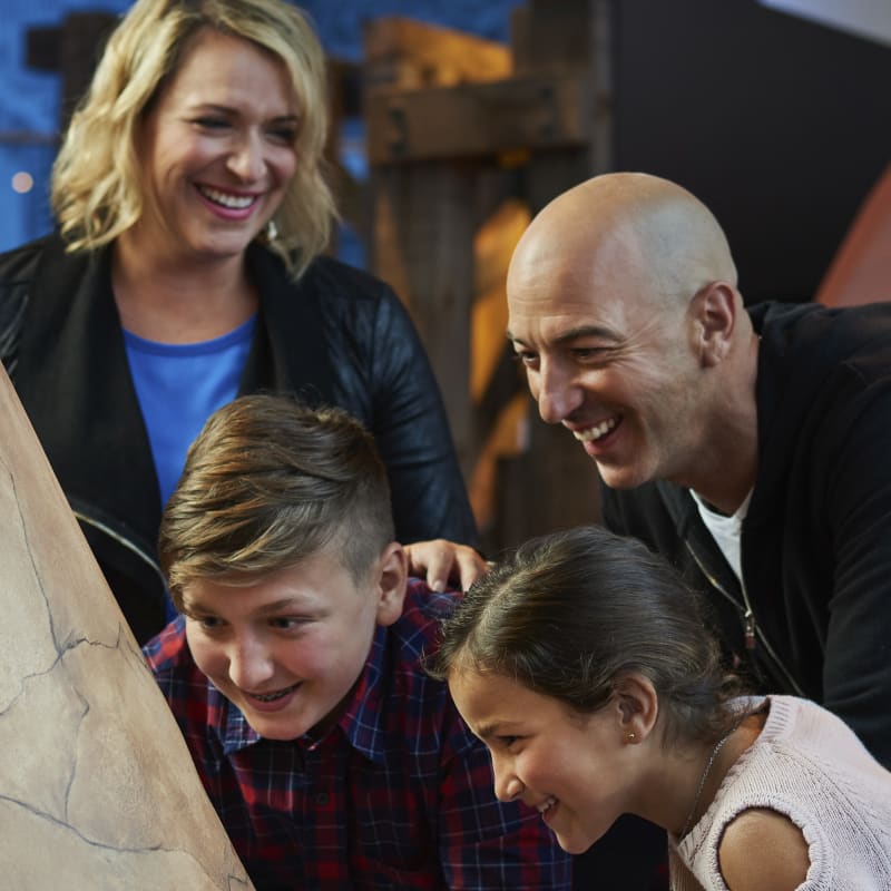 Two parents and two kids at the Canadian Children's Museum.