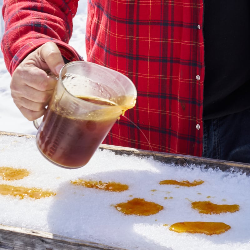 Making maple taffy on snow.