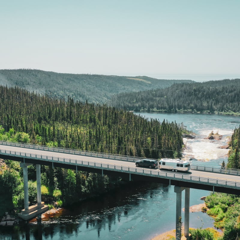 Car on a scenic road in Côte-Nord.