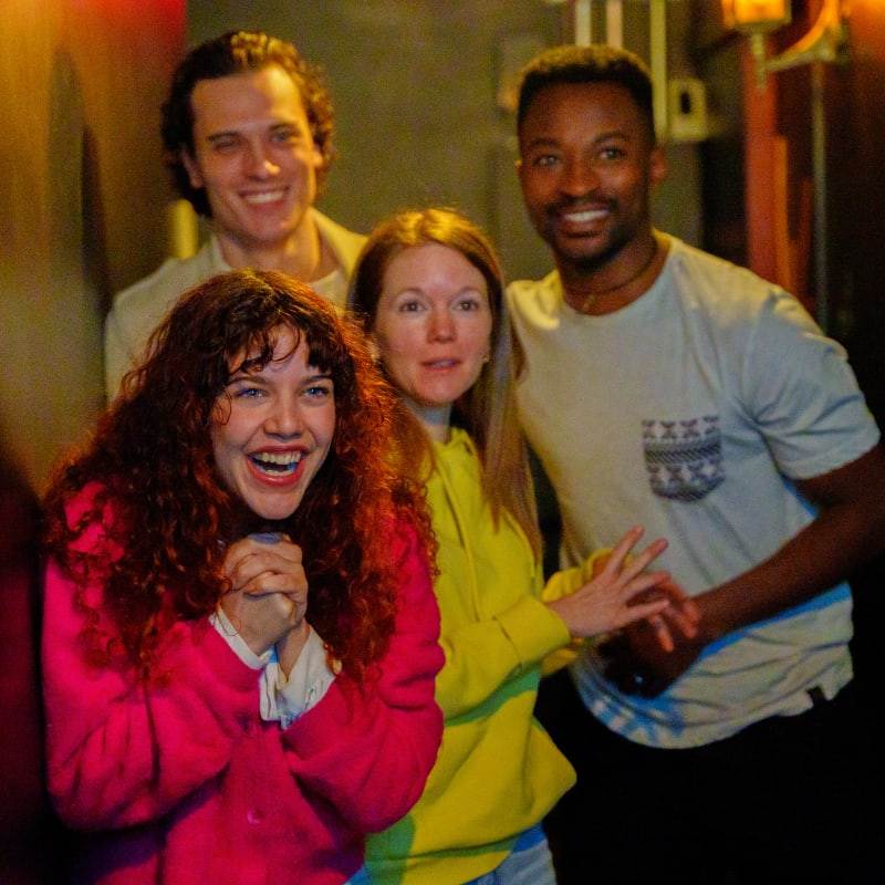 Group of four happy-looking people.