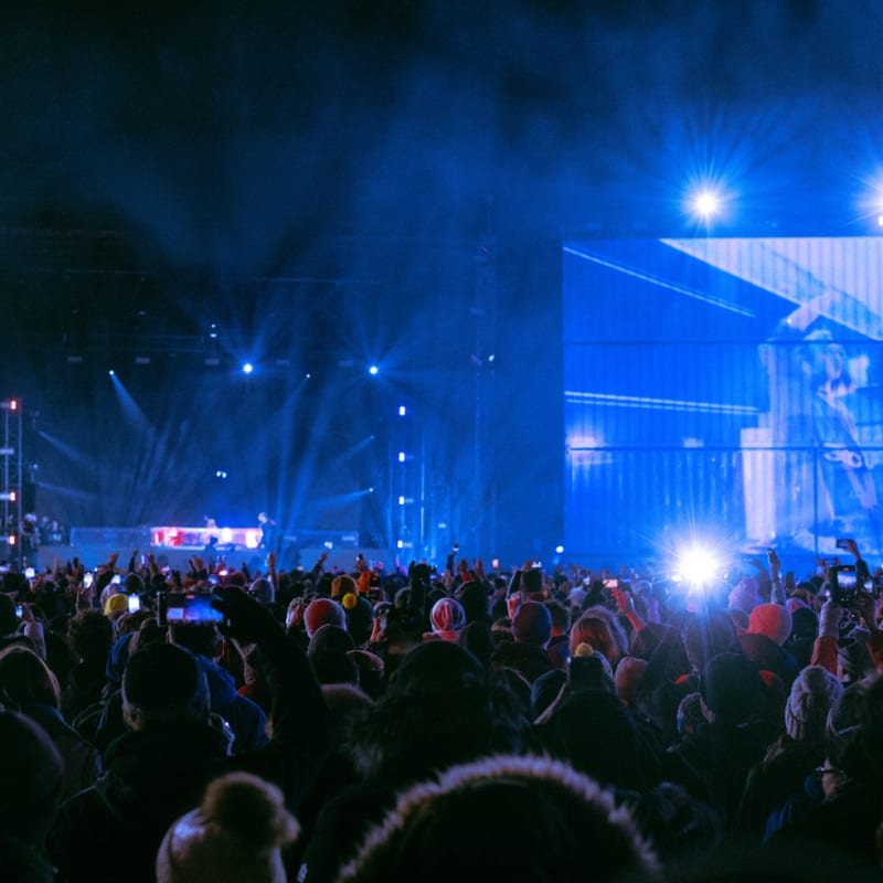 Igloofest concert on an outdoor stage in the winter.