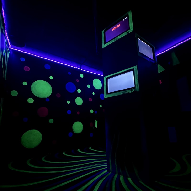 Dark room in an escape room experience.