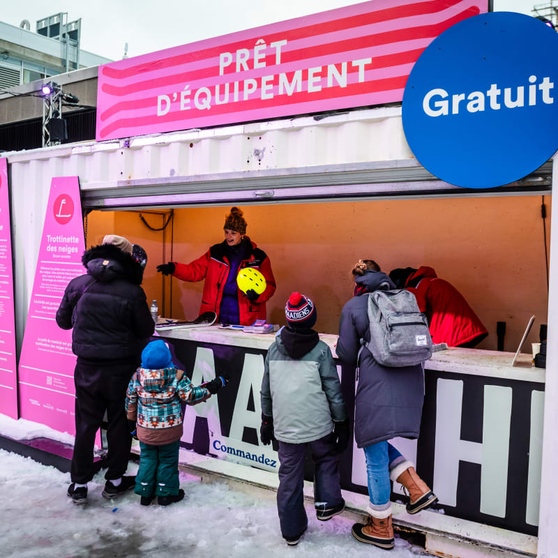 Family at slides in Montréal.