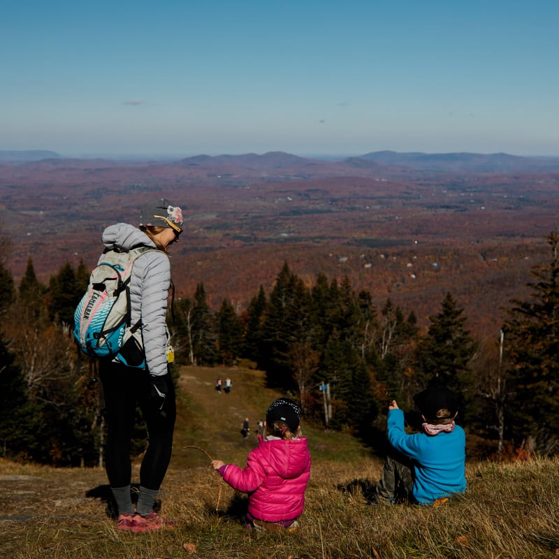 Mother and two kids at Mont SUTTON in the fall.