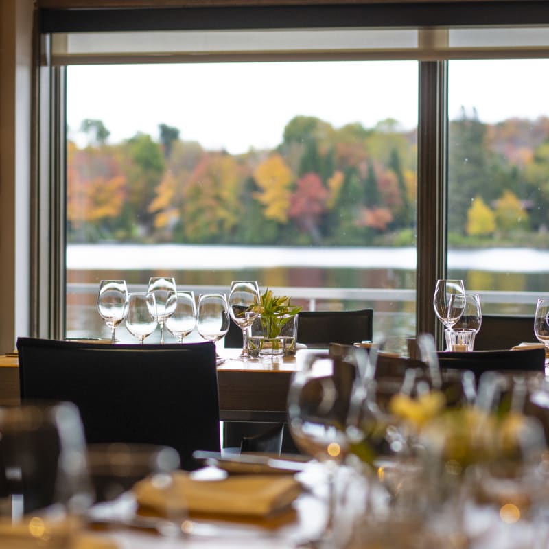 Dining room with a view of the fall landscape.