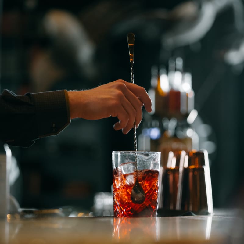 Mixologist stirring a cocktail at the bar at the Château Frontenac.