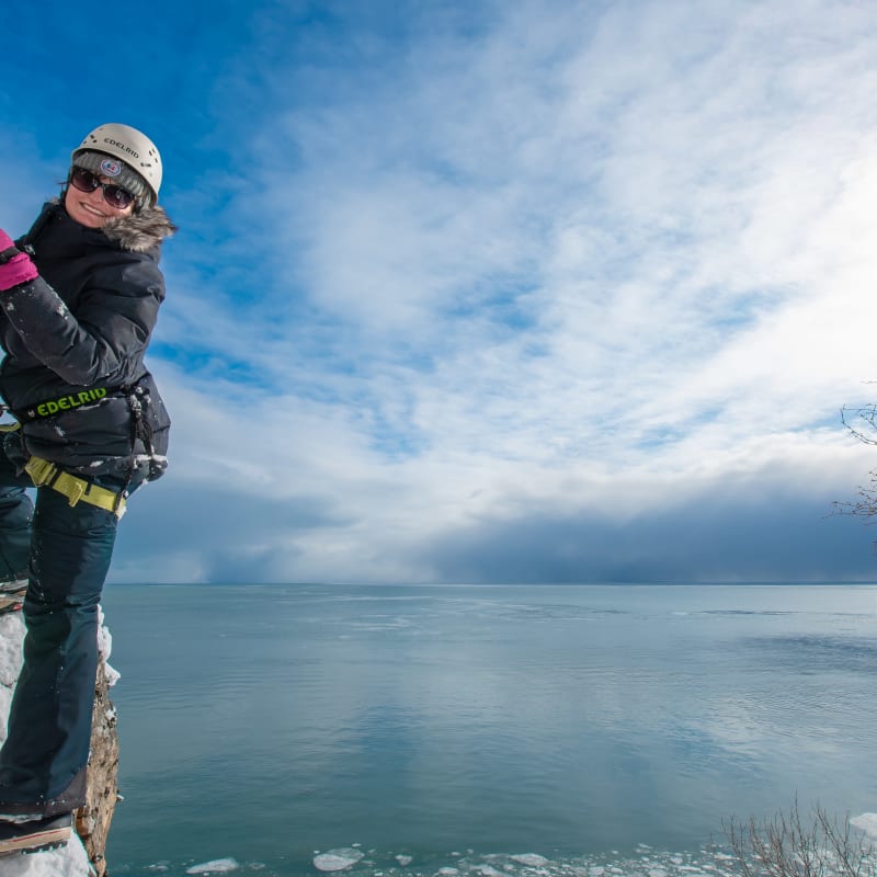 Woman on the Manoir Richelieu Via Ferrata in winter.
