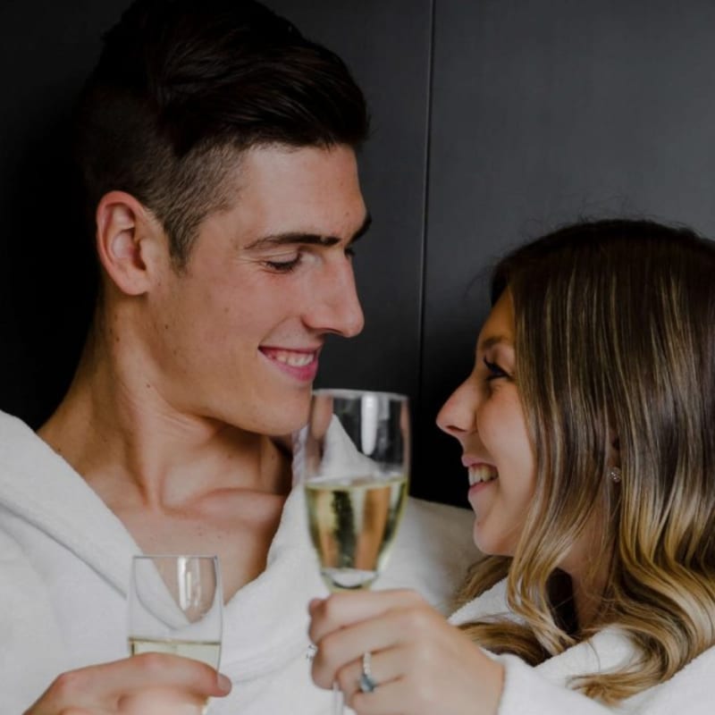 Couple holding glasses of sparkling wine
