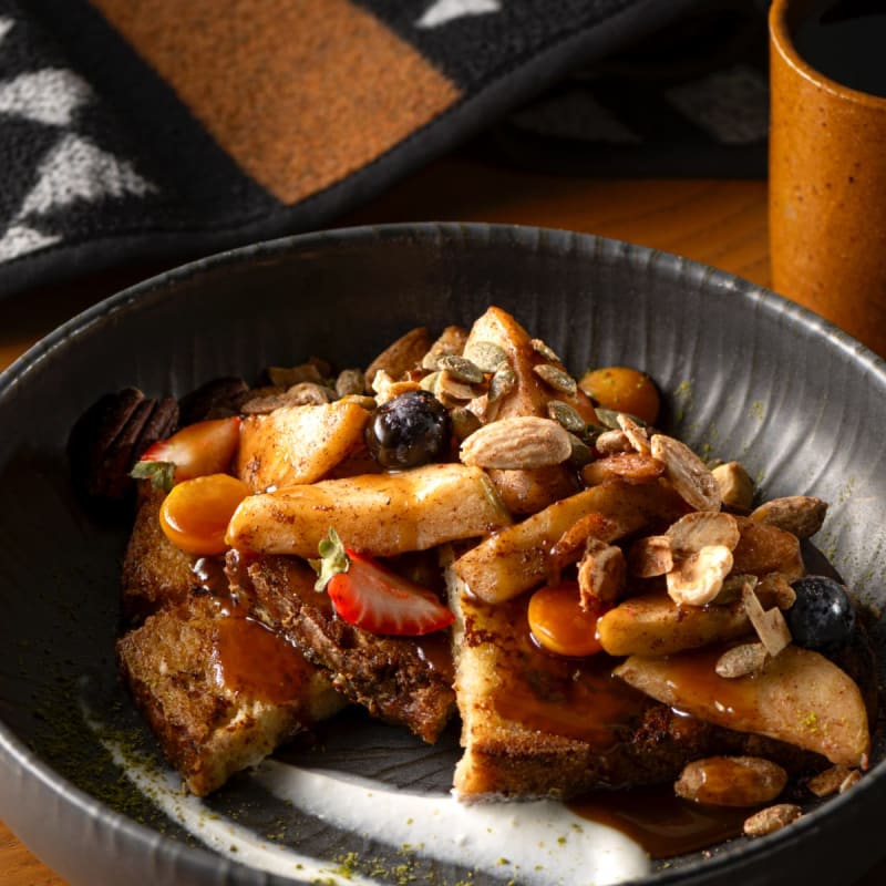 Breakfast plate at La Traite Restaurant, with cup of coffee.
