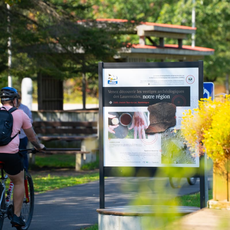 Cyclist on the P'tit train du Nord linear park.