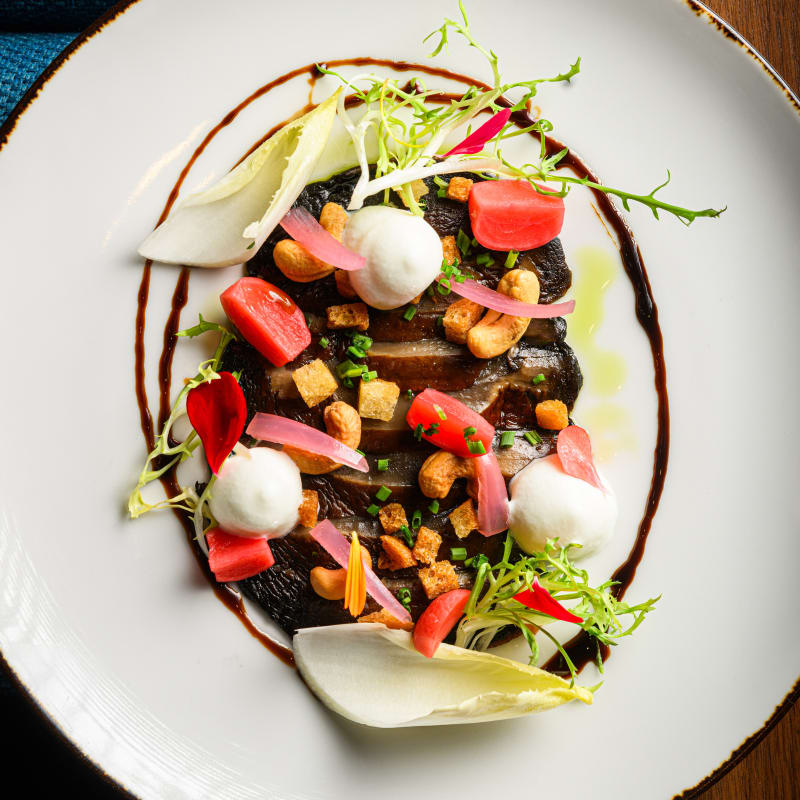 Elegantly plated dish at Cabu restaurant