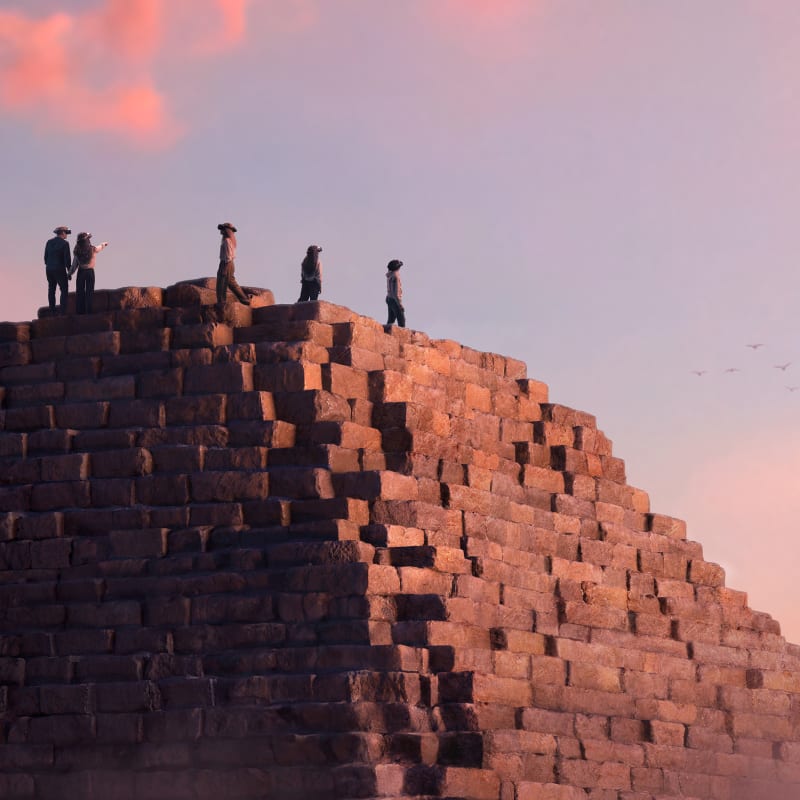 People seen in an virtual reality environment at the Horizon of Khufu exhibit.