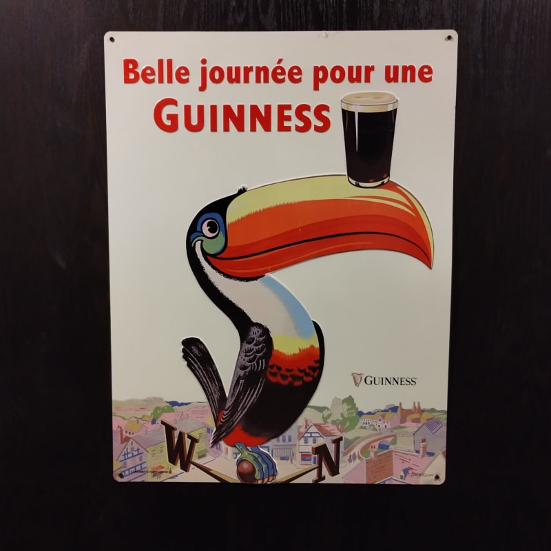 Guinness metal sign.