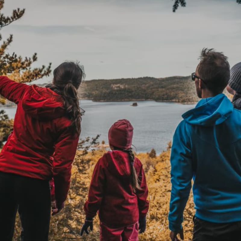 Family hiking in the fall at Base de plein air Air-Eau-Bois.
