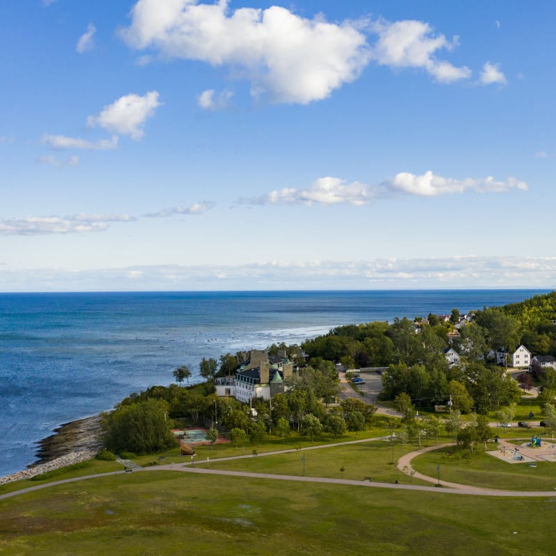 Aerial view of Baie-Comeau in the summer by the river. 